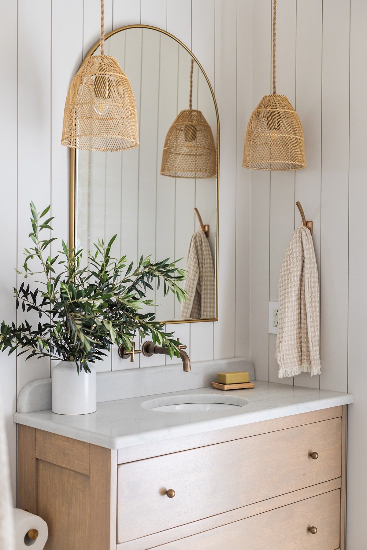 bathroom with sherwin williams egret white shiplap walls and wood vanity