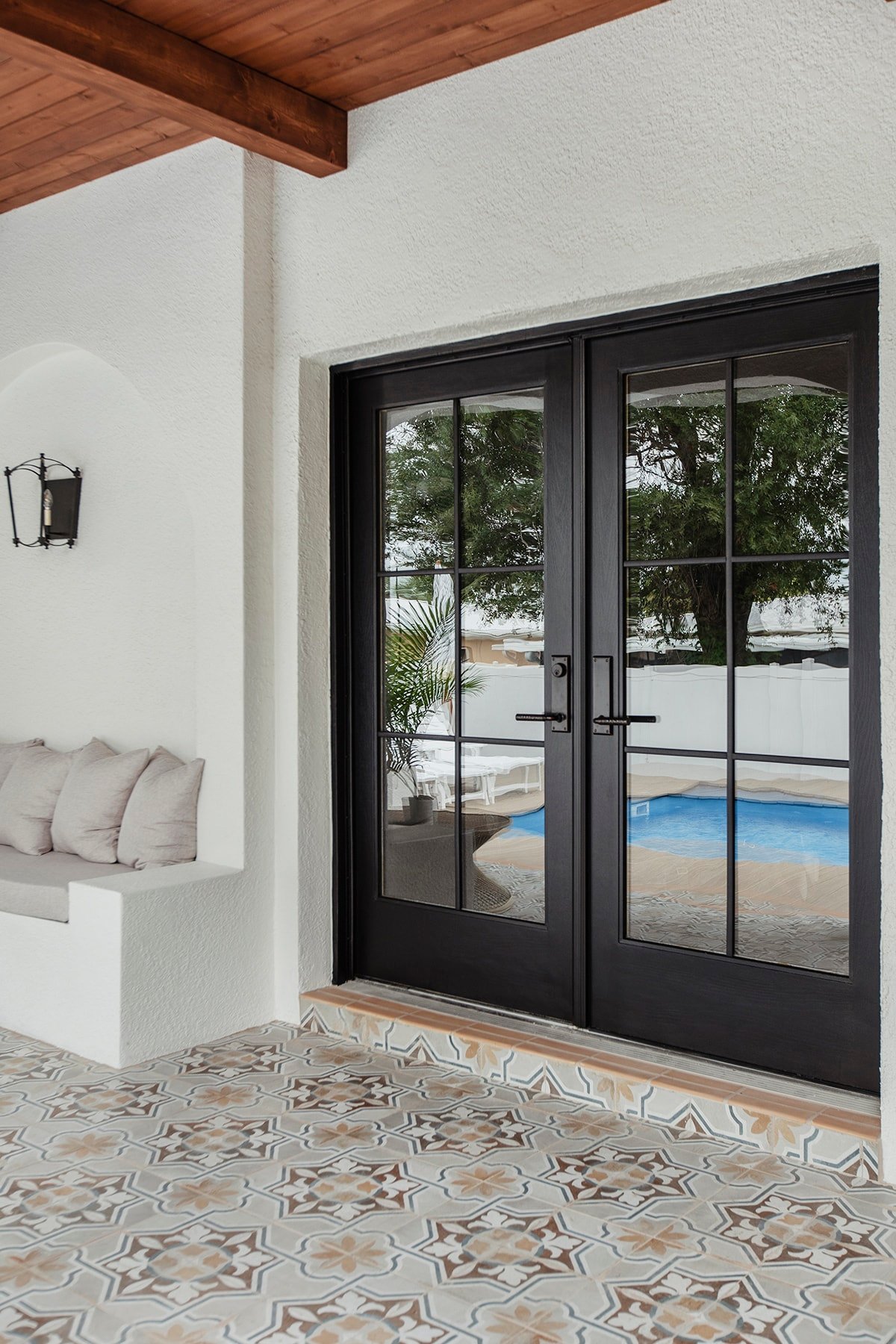 black french patio doors on a covered porch