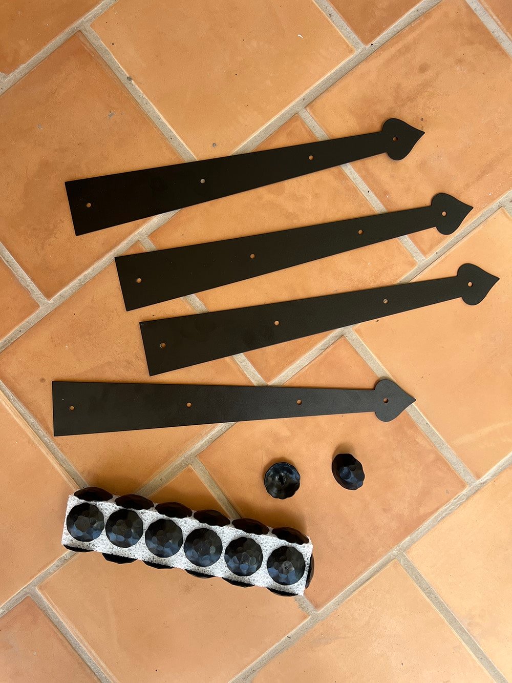 black metal decorative door hinge straps and clavos