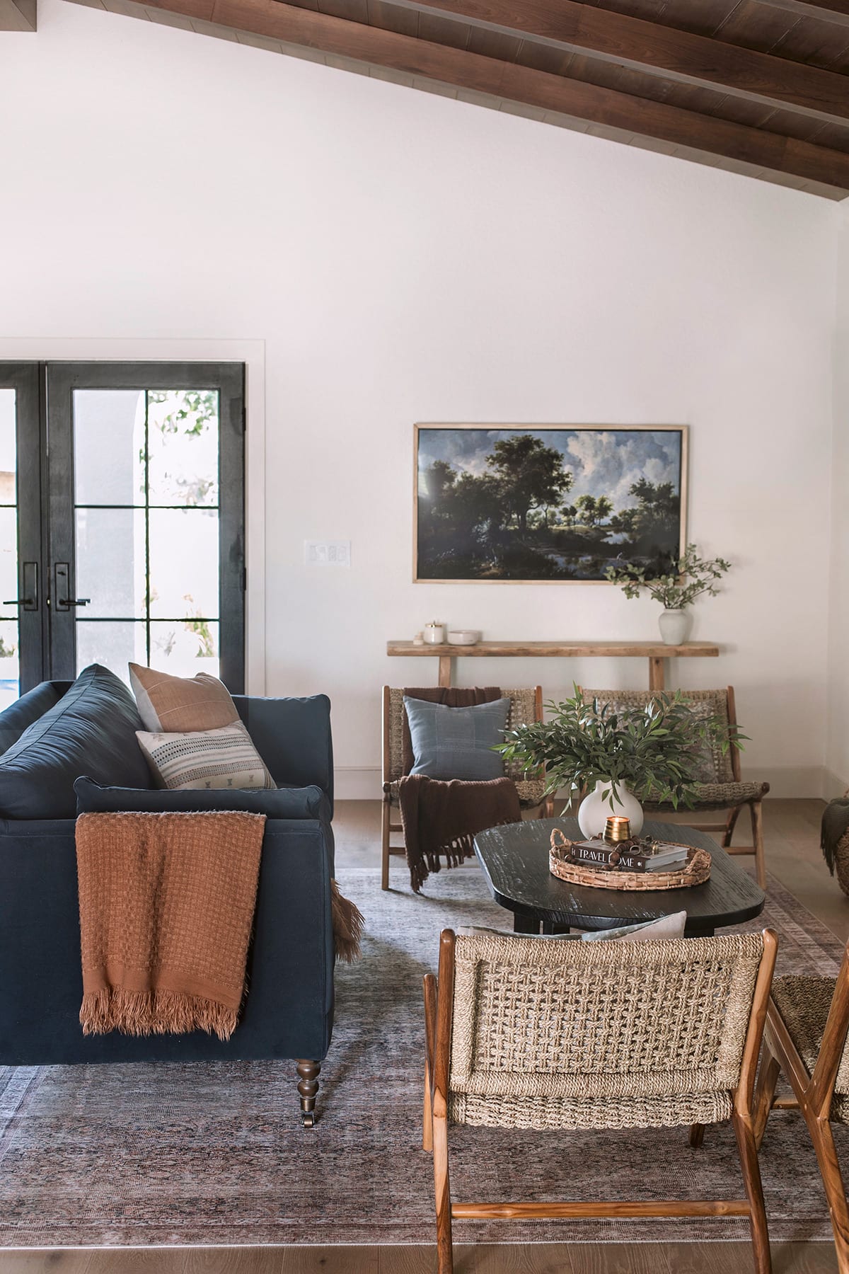 spanish style living room with sw alabaster walls