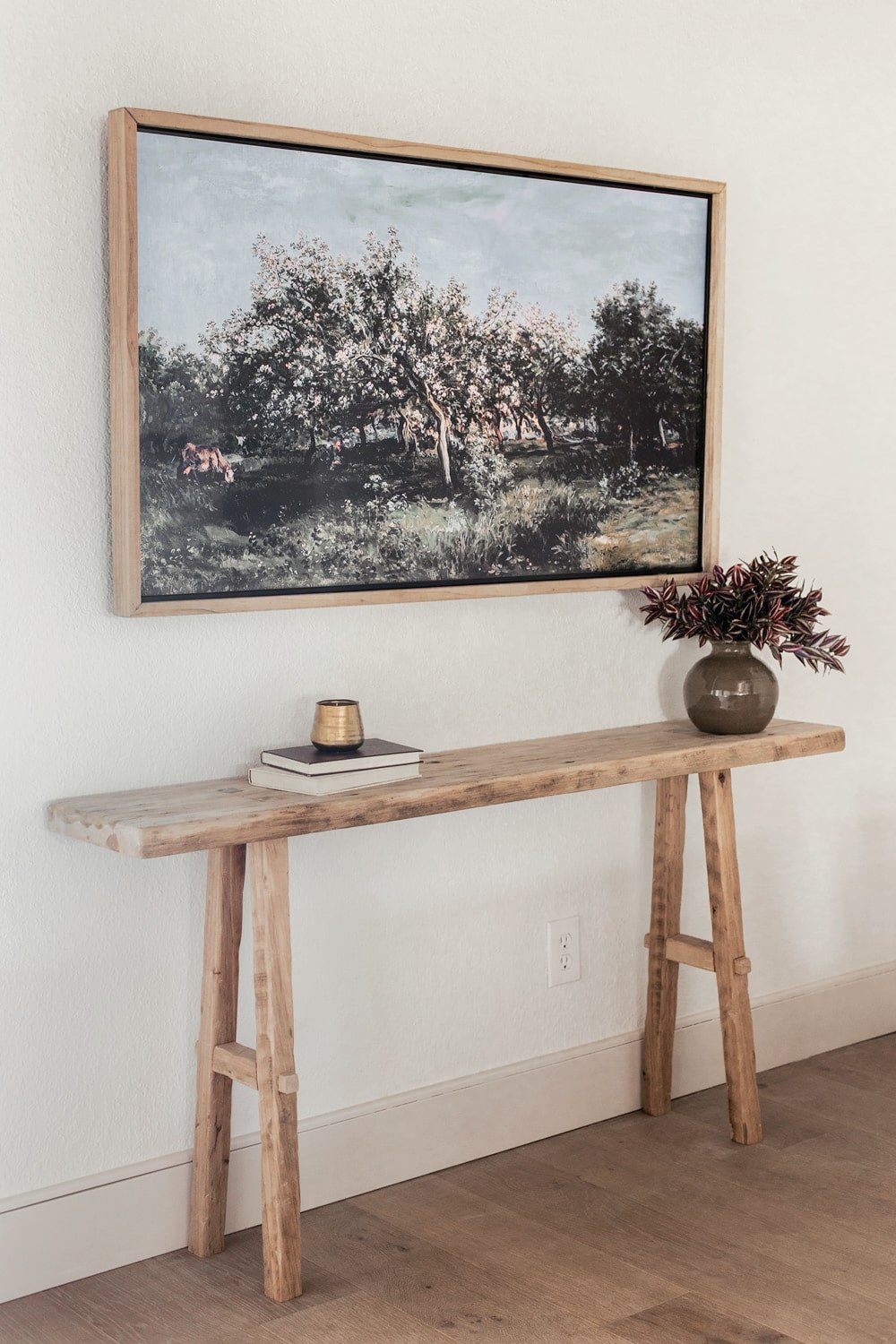 diy rustic console table underneath a TV