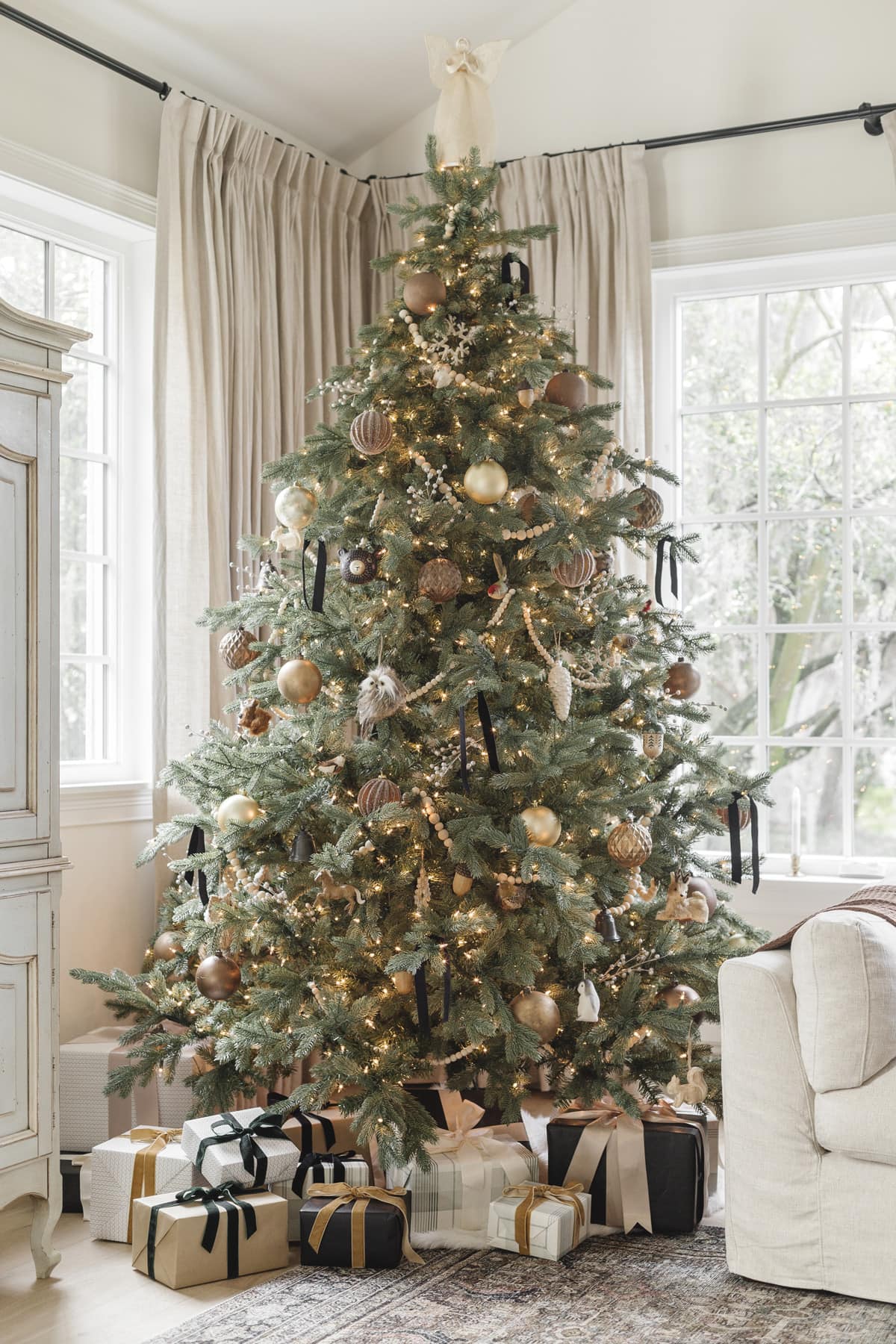 Christmas Tree with Black and Brass Ornaments - The Lilypad Cottage