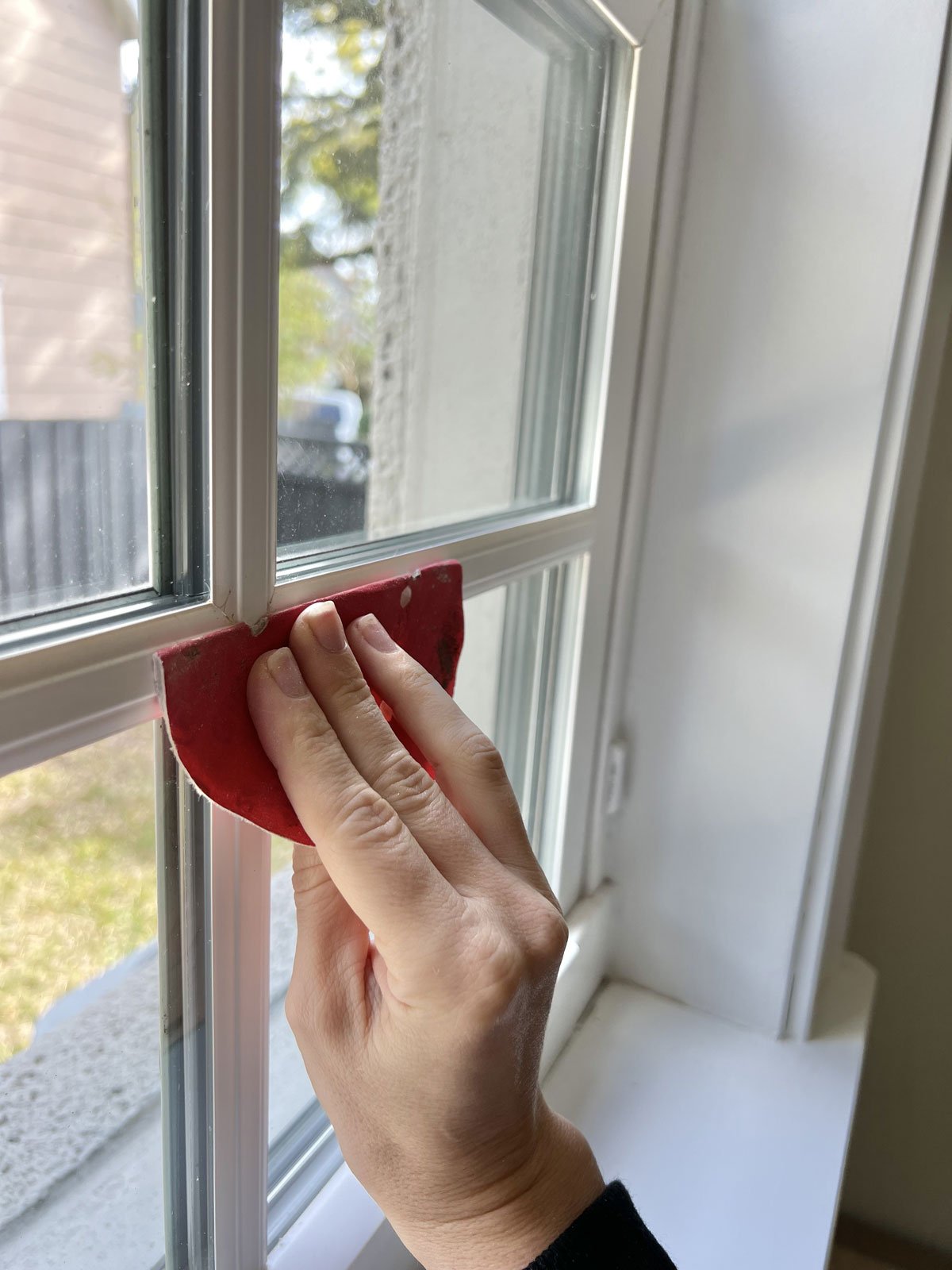 sanding a vinyl window