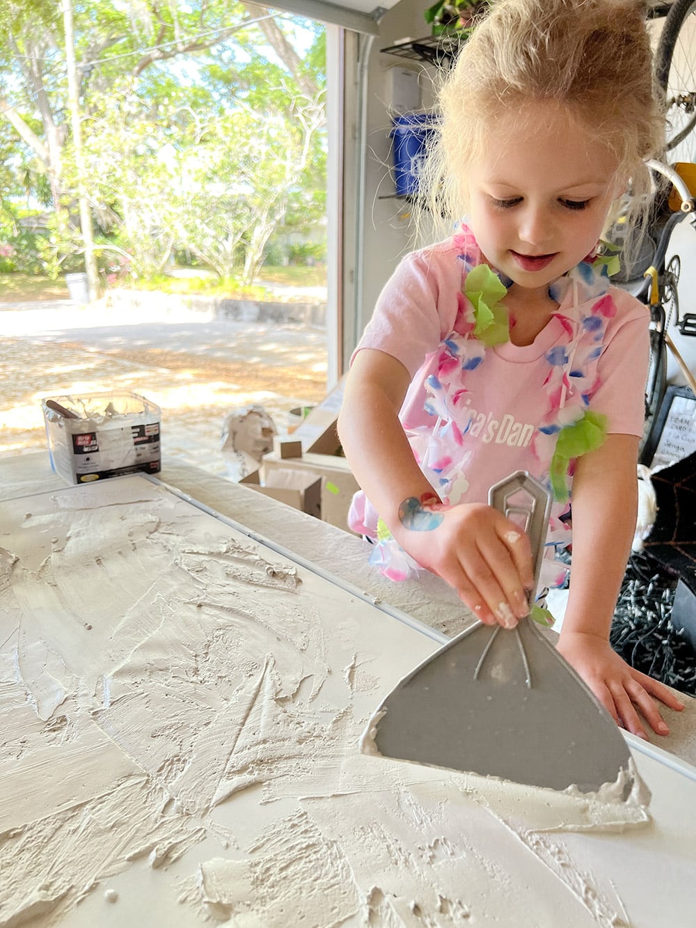 making diy textured canvas art with plaster