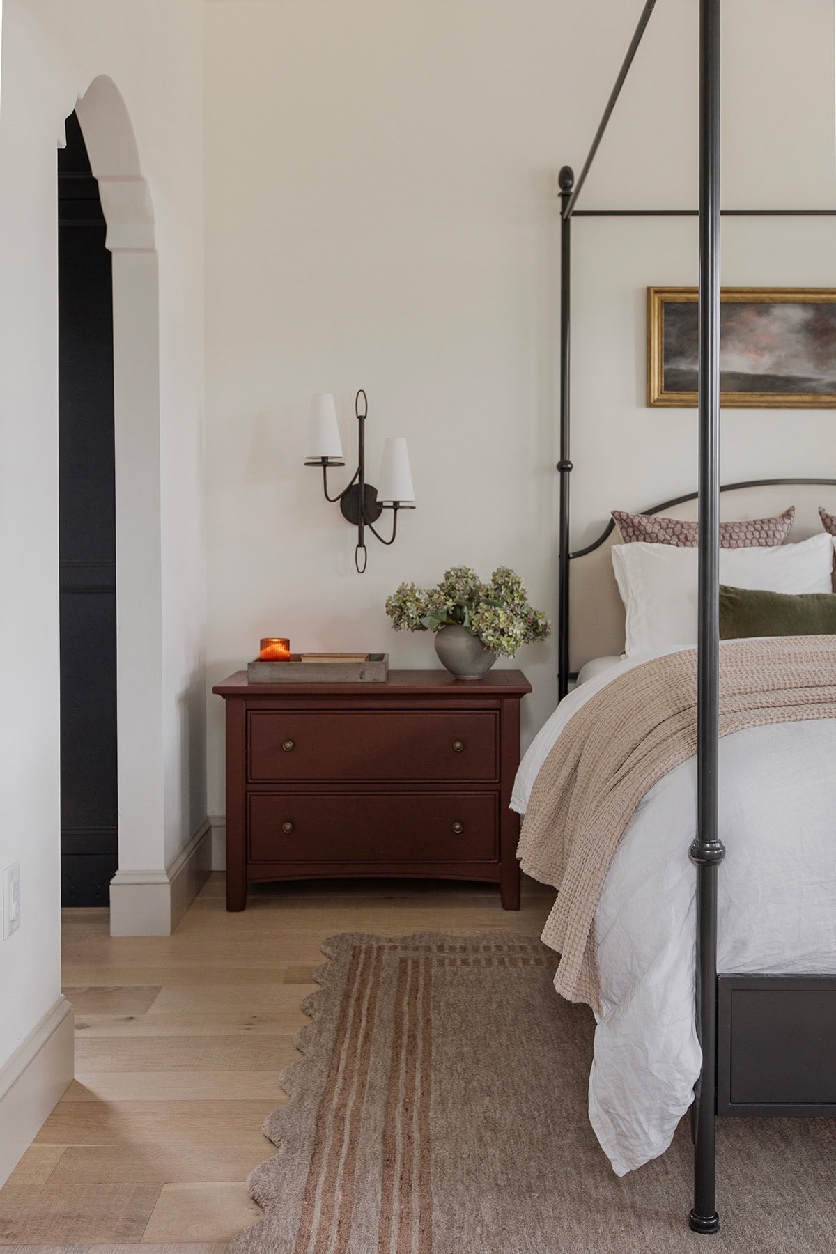 master bedroom with loloi scottie rug, twopages sarale curtains, canopy bed