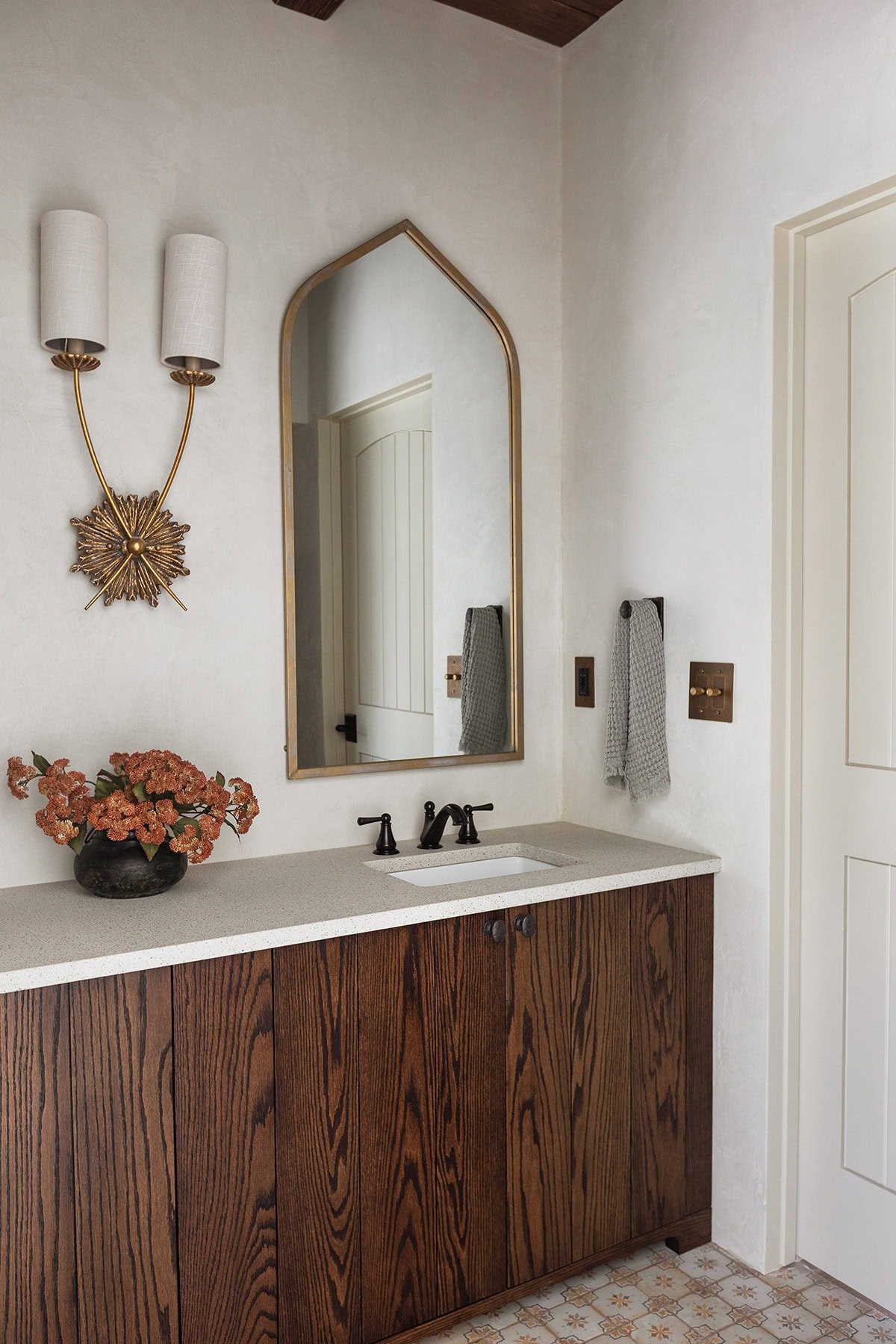mediterranean bathroom with dark oak wood vanity