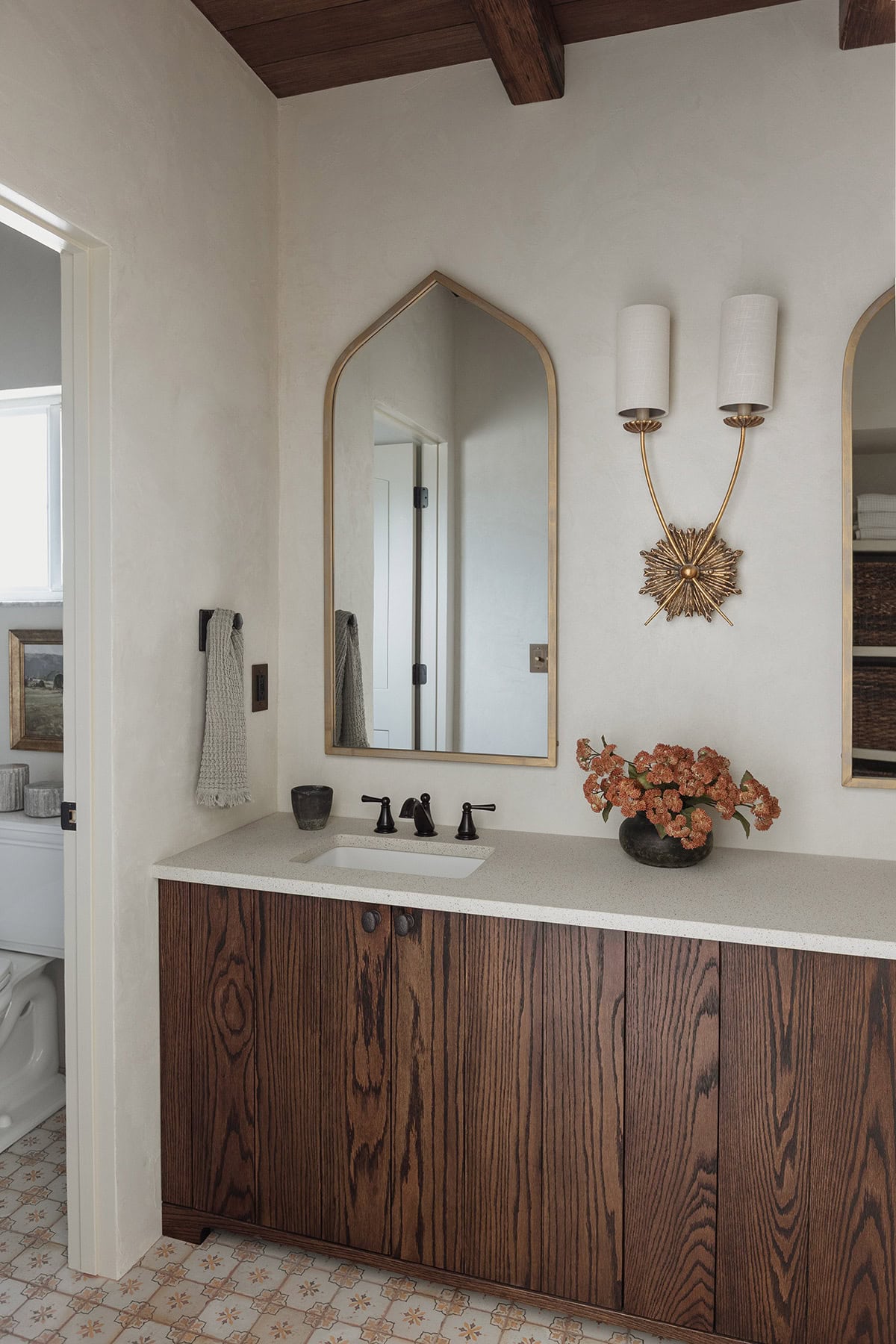 mediterranean bathroom with dark oak wood vanity