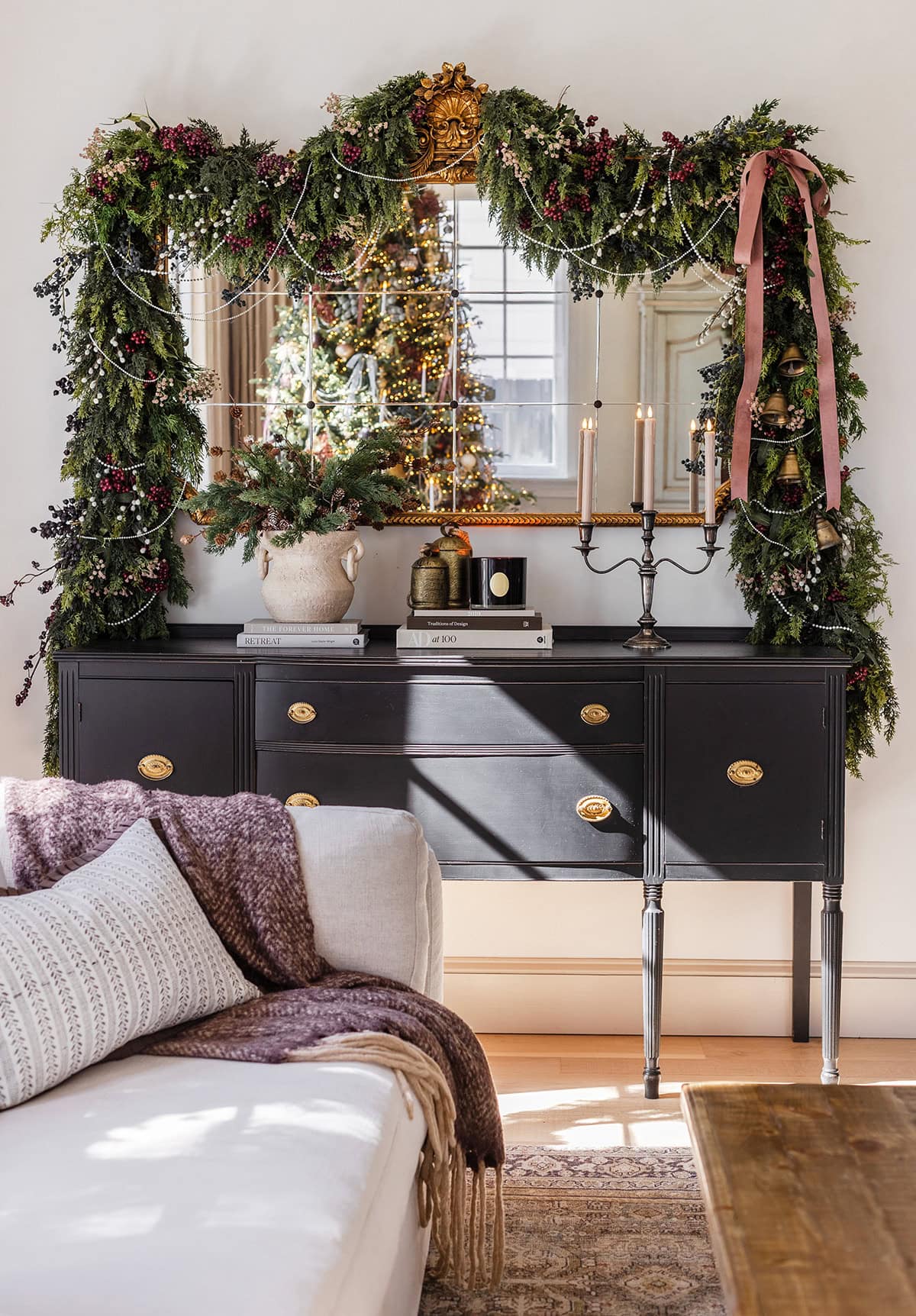 cedar garland mirror with berries and pearls