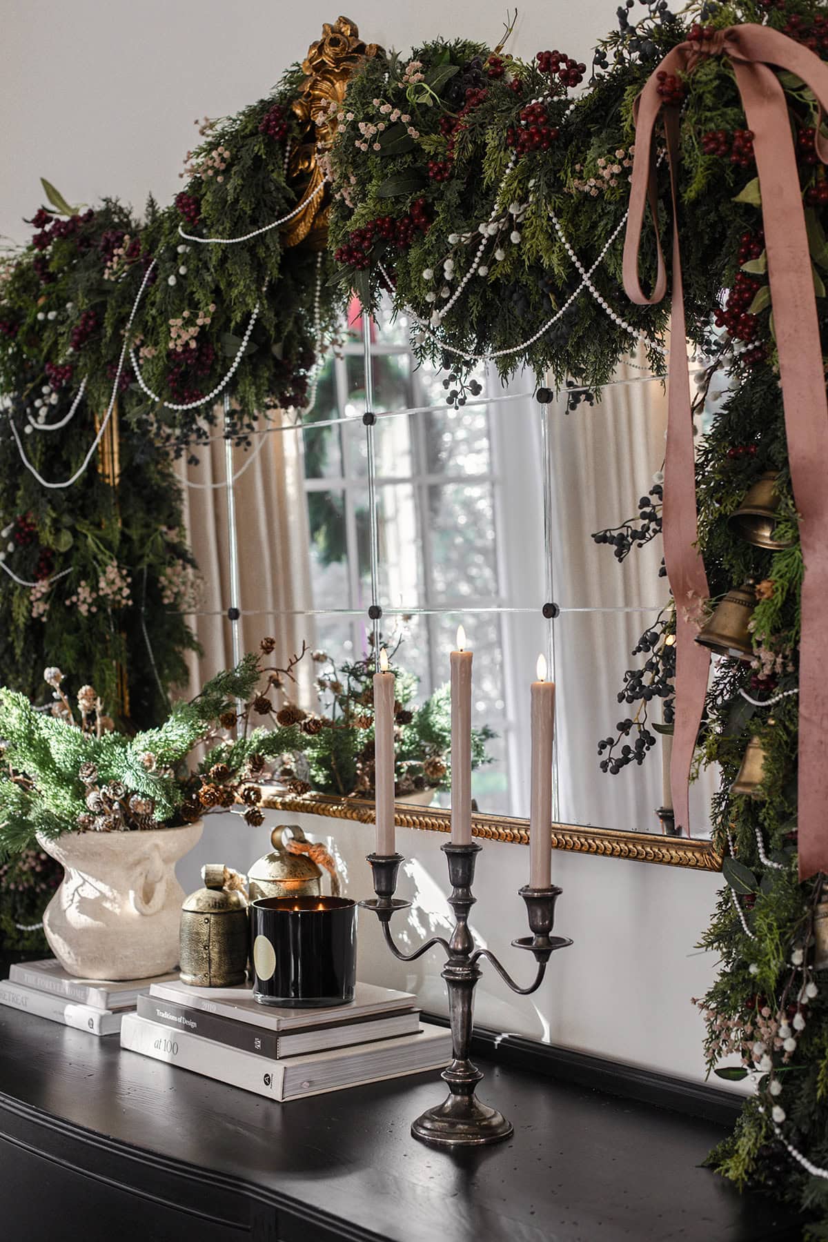 cedar garland mirror with berries and pearls